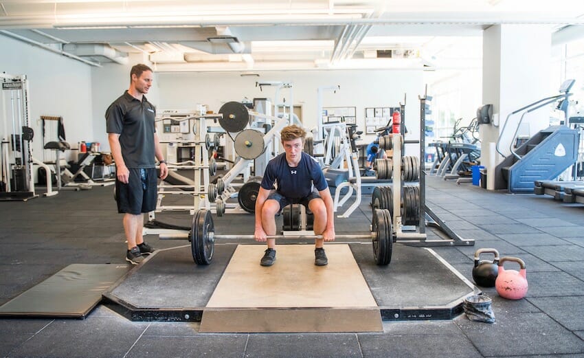 powerlifting training with a personal trainer
